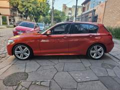 BMW 125i 2014, COM APENAS 77.000 KM, RARA COR FIRE ORANGE imagem 4