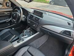 BMW 125i 2014, COM APENAS 77.000 KM, RARA COR FIRE ORANGE imagem 11