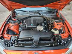 BMW 125i 2014, COM APENAS 77.000 KM, RARA COR FIRE ORANGE imagem 14