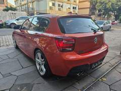 BMW 125i 2014, COM APENAS 77.000 KM, RARA COR FIRE ORANGE imagem 5