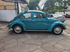 FUSCA 1300 1974 NA RARA COR VERDE MARÍTIMO, COM INTERIOR ORIGINAL NA COR AREIA, CARRO EM PERFEITO ESTADO DE ORIGINALIDADE, COM APENAS 105.000 KM ORIGINAIS imagem 8