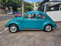 FUSCA 1300 1974 NA RARA COR VERDE MARÍTIMO, COM INTERIOR ORIGINAL NA COR AREIA, CARRO EM PERFEITO ESTADO DE ORIGINALIDADE, COM APENAS 105.000 KM ORIGINAIS imagem 4