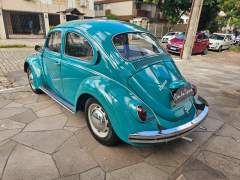 FUSCA 1300 1974 NA RARA COR VERDE MARÍTIMO, COM INTERIOR ORIGINAL NA COR AREIA, CARRO EM PERFEITO ESTADO DE ORIGINALIDADE, COM APENAS 105.000 KM ORIGINAIS imagem 5
