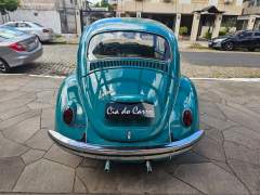FUSCA 1300 1974 NA RARA COR VERDE MARÍTIMO, COM INTERIOR ORIGINAL NA COR AREIA, CARRO EM PERFEITO ESTADO DE ORIGINALIDADE, COM APENAS 105.000 KM ORIGINAIS imagem 6