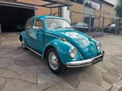 FUSCA 1300 1974 NA RARA COR VERDE MARÍTIMO, COM INTERIOR ORIGINAL NA COR AREIA, CARRO EM PERFEITO ESTADO DE ORIGINALIDADE, COM APENAS 105.000 KM ORIGINAIS imagem 1