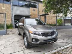 KIA SORENTO EX 3.5 AUTOMÁTICA 4X4 7 LUGARES REVISÕES NA CONCESSIONÁRIA ANO 2013 COM APENAS 98600 Km. imagem 1
